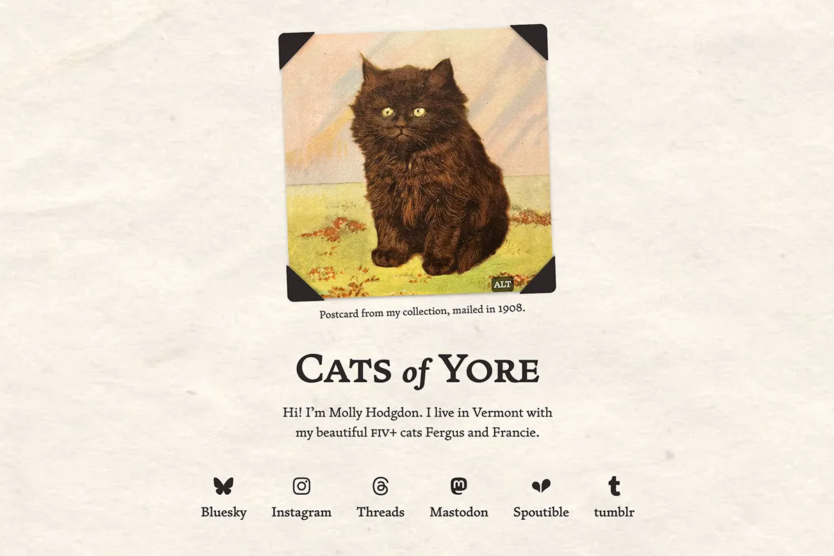 Screenshot of the Cats of Yore homepage. A colorized photograph of a small round cat with black photo corners is at the top. Below that is the title Cats of Yore. At the bottom of the page is a list of social media accounts with their logos.