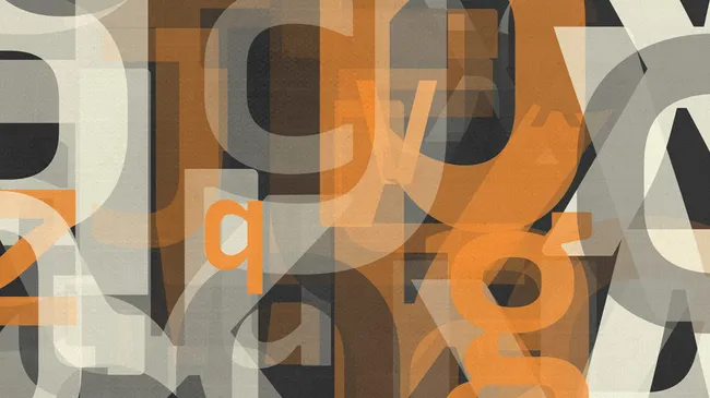 Random pattern of letters in various sizes in shades of orange, tan, and black. Some of the letters are large and bleed off the page.