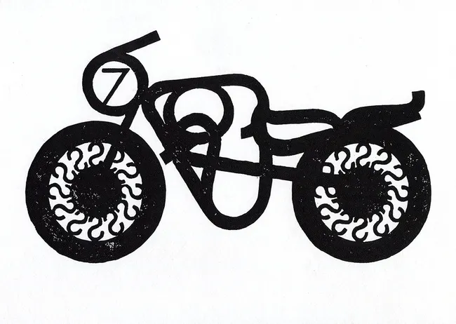 Glyphs from Futura assembled in to the shape of a motorcycle